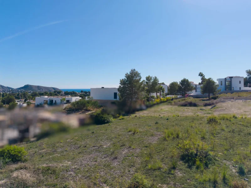 Vlak bouwperceel in El Tesoro, Moraira met zeezicht