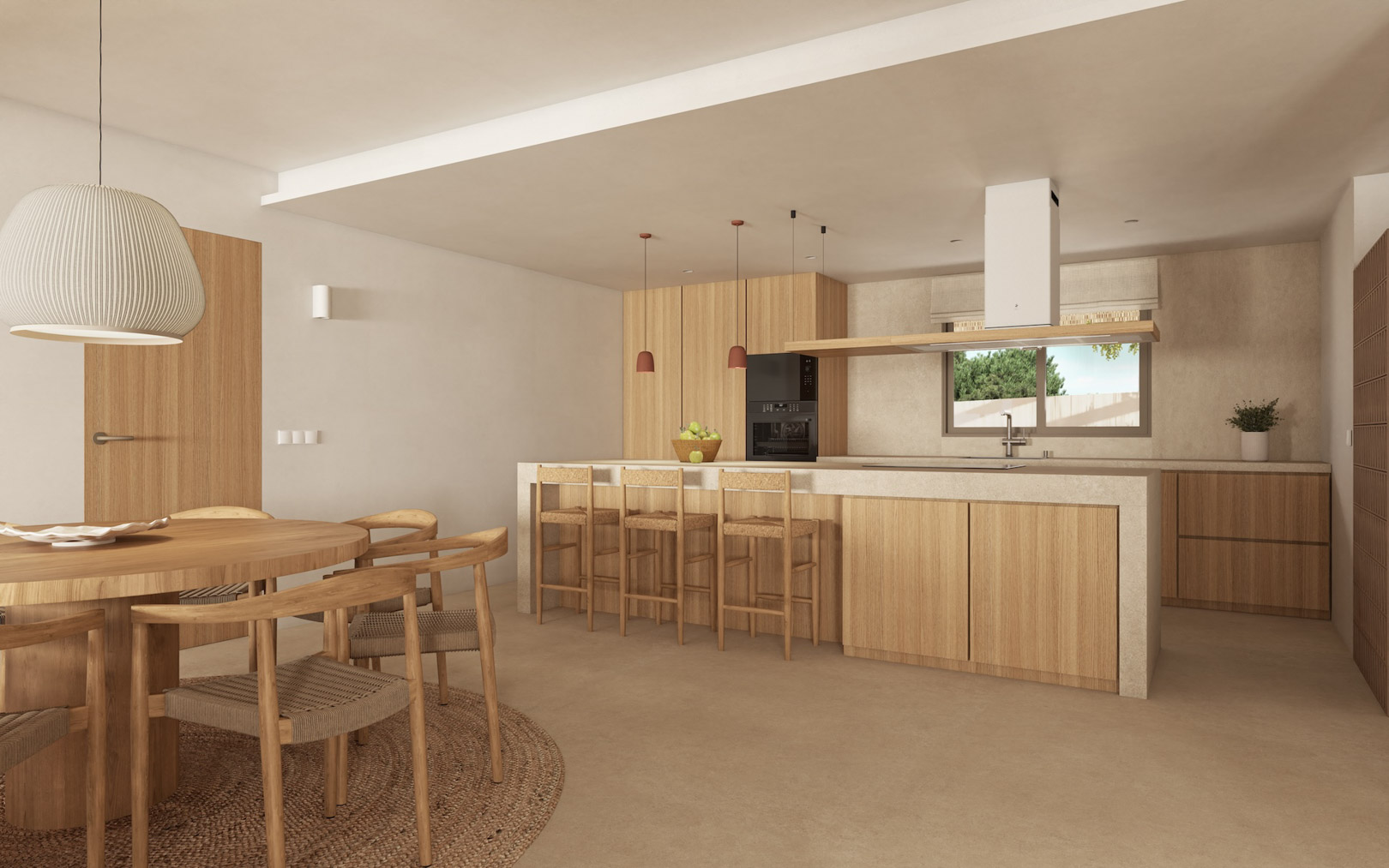 Open keuken met een stenen eiland, licht houten kasten en een geïntegreerde eethoek met een ronde tafel en stoelen van natuurlijk vlechtwerk.