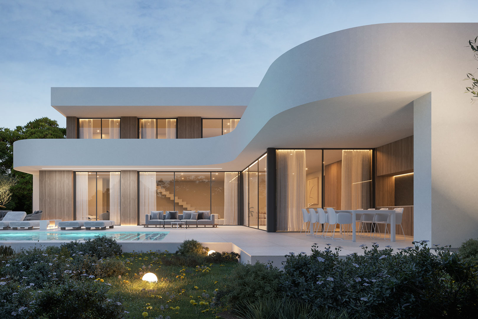 Moderne villa met organische gebogen lijnen, kamerhoge glaspartijen, een ruim terras met buitenmeubilair en een verlicht zwembad bij avondschemering.