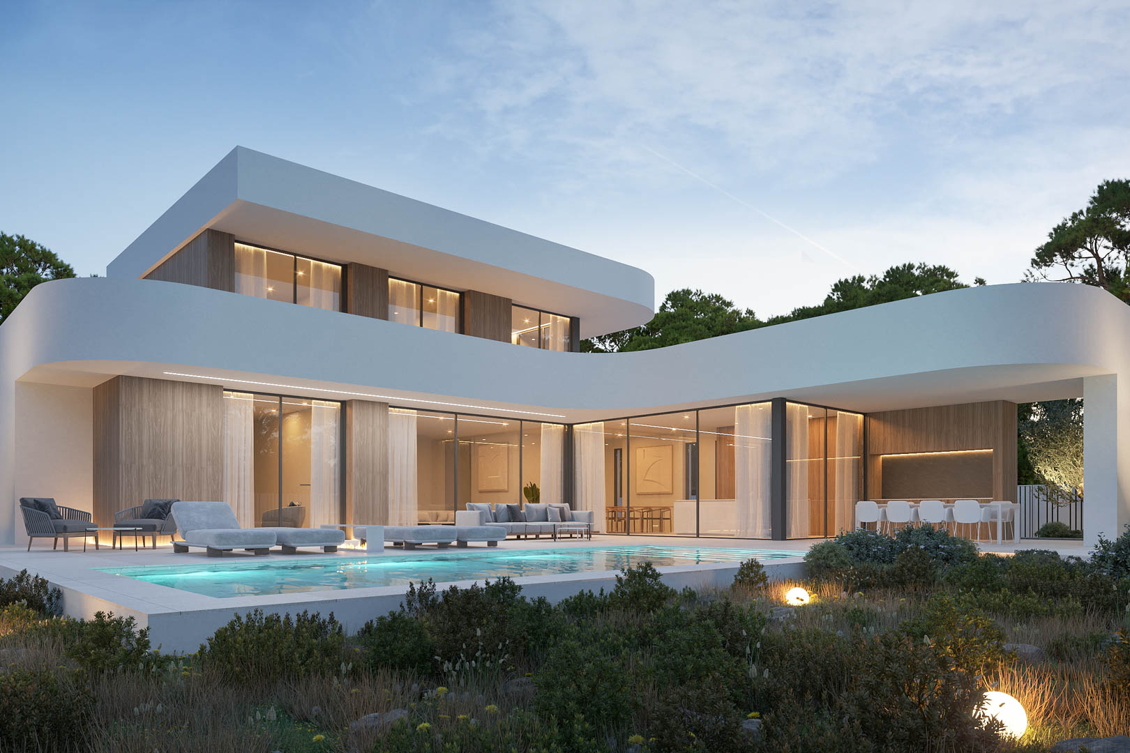 Moderne villa met witte gebogen gevel, houten accenten, een overloopzwembad en verlichte terrassen met lounge- en eetgedeelte bij avondlicht.