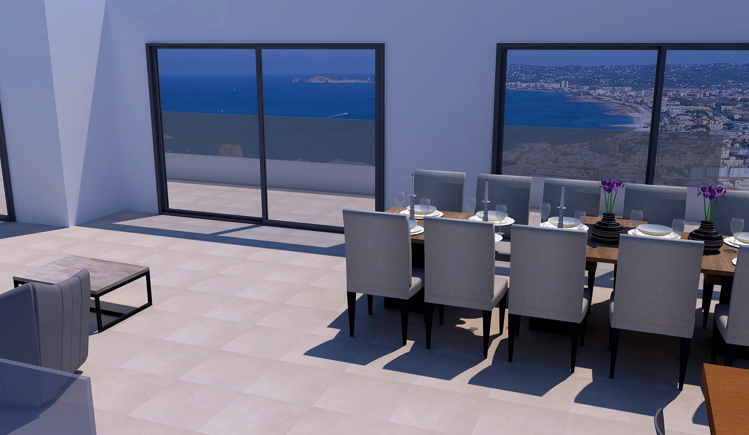 Ruime eethoek met een grote houten tafel en glazen schuifdeuren die een panoramisch uitzicht bieden over de zee en de baai van Jávea.