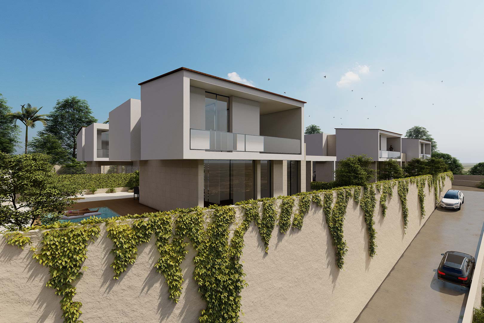 Buitenaanzicht van moderne villa's met glazen balkons en hoge muren begroeid met klimop. De architectuur kenmerkt zich door strakke lijnen en een minimalistisch wit ontwerp.