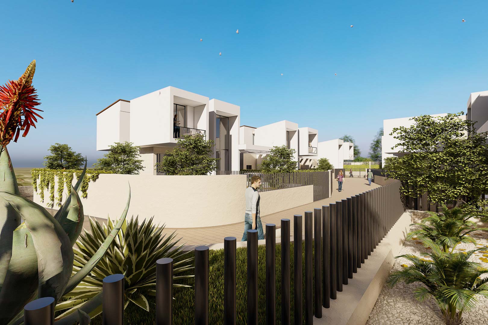 Buitengevel van witte kubistische villa's met glazen balkons, geïntegreerd in een landschap met omheiningsmuren en mediterrane vegetatie.