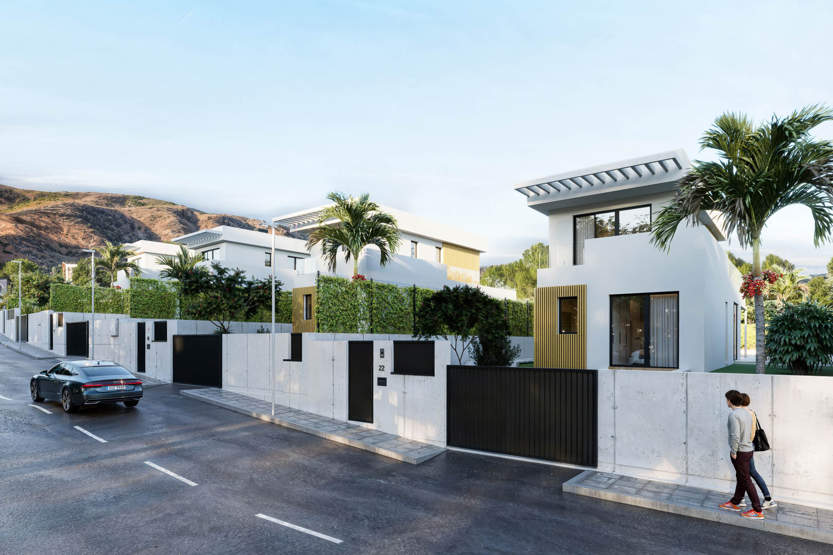 Buitenaanzicht van moderne witte villa's met houten details en betonnen muren. Voorzien van zwarte metalen poorten, pergola's op het dak en een bergachtig landschap.