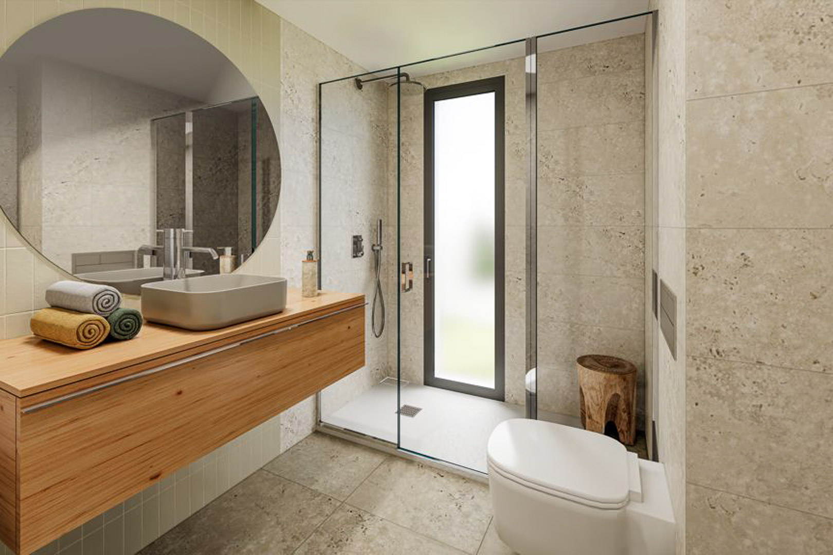 Moderne badkamer met zwevend houten meubel, opzetwastafel en ronde spiegel. Voorzien van een inloopdouche met glazen wand en wandafwerking in een natuurlijke steenlook.