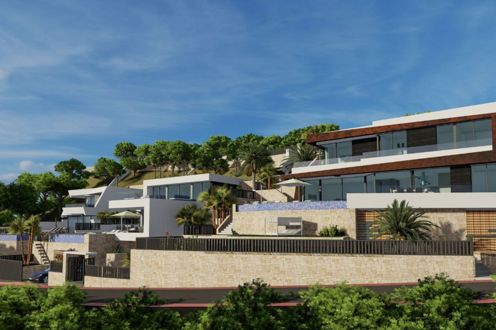 Exterieur van de moderne villa met gestapelde niveaus, natuurstenen muren, een overloopzwembad en grote raampartijen in een mediterraan landschap.