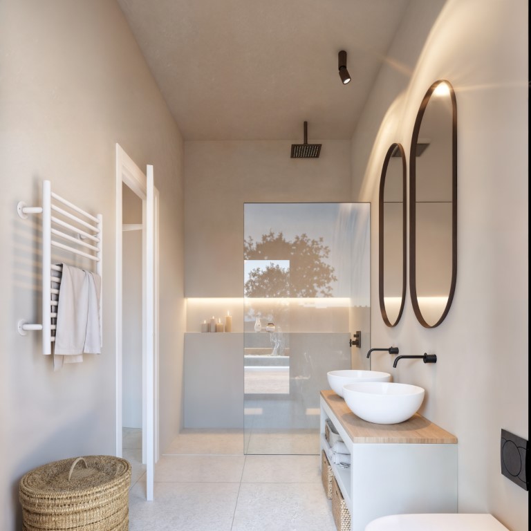 Moderne badkamer met dubbele wastafel op een houten blad, zwarte inbouwkranen, verlichte ovale spiegels en een inloopdouche met glazen wand.