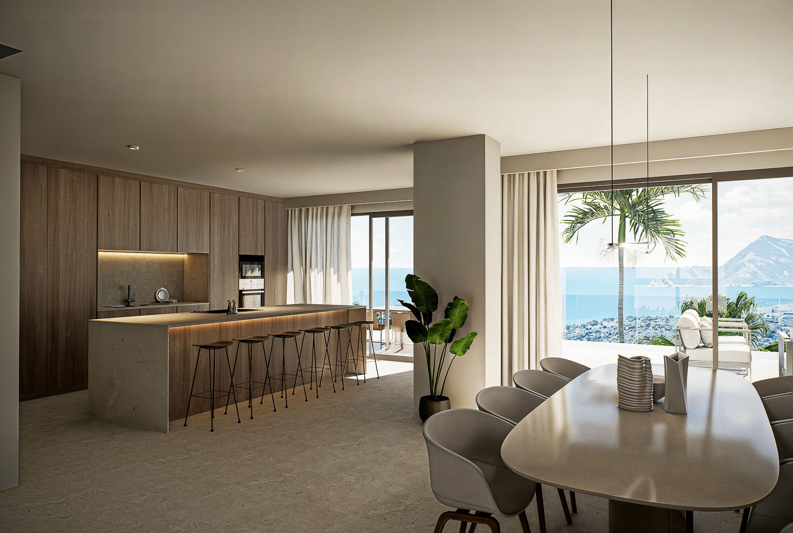 Designkeuken met stenen kookeiland en geïntegreerde eethoek, voorzien van kamerhoge ramen met panoramisch uitzicht op de Middellandse Zee.