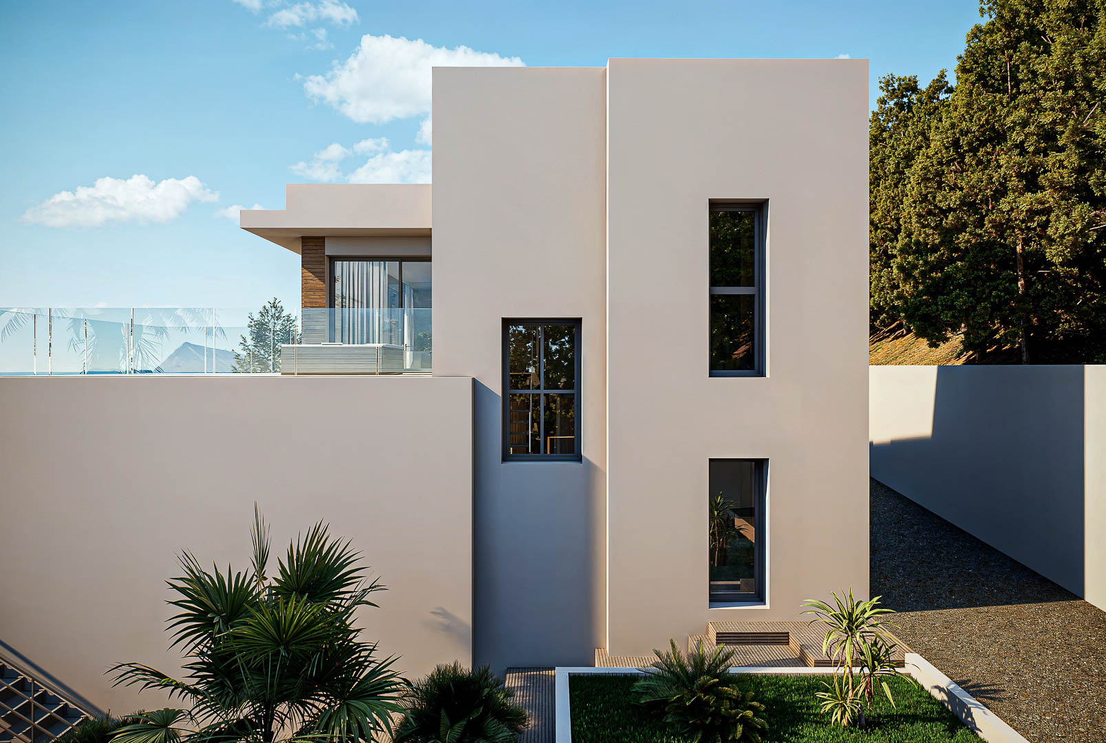 Minimalistische gevel met geometrische volumes in neutrale tinten, verticale ramen en een boventerras met glazen balustrades en uitzicht op zee.
