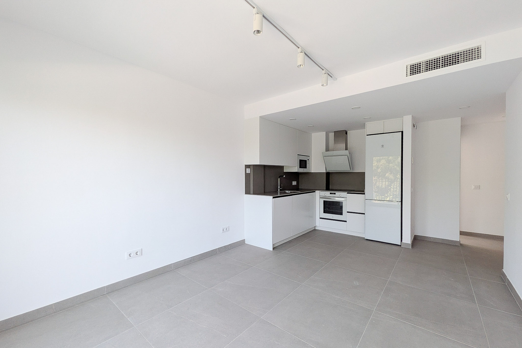 Woonkamer met open keuken