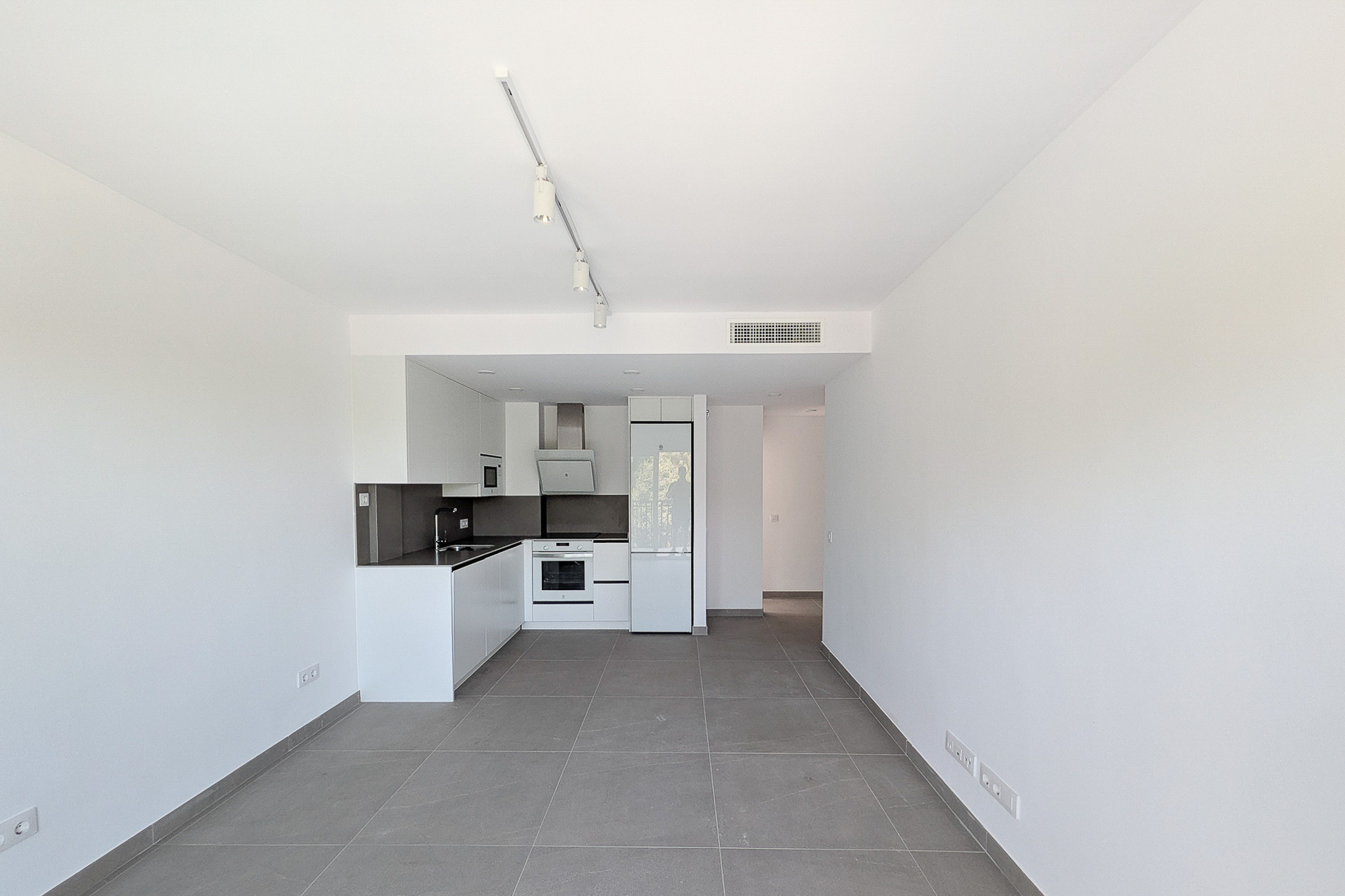 Woonkamer met open keuken