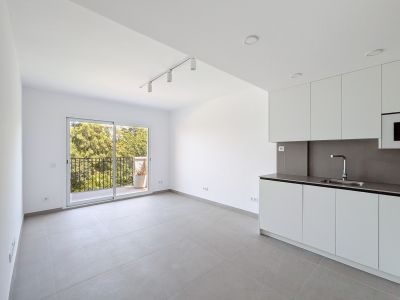 Woonkamer met open keuken