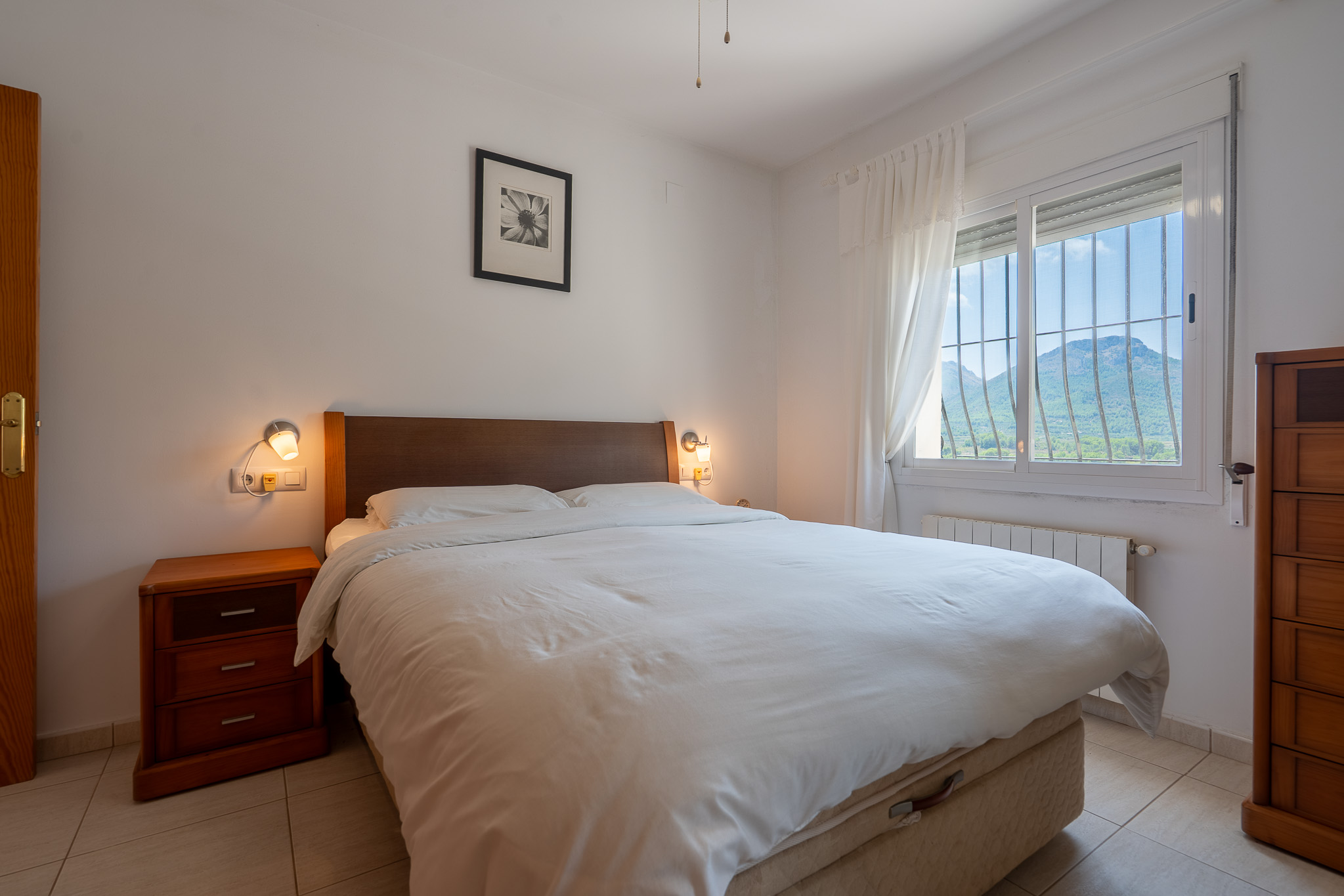 Slaapkamer met bergzicht