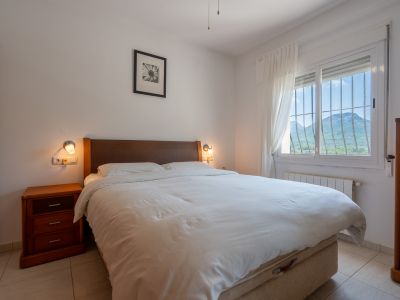 Slaapkamer met bergzicht