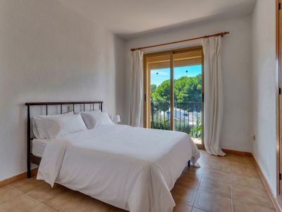 Slaapkamer met balkon