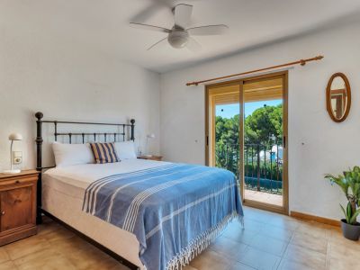 Slaapkamer met balkon