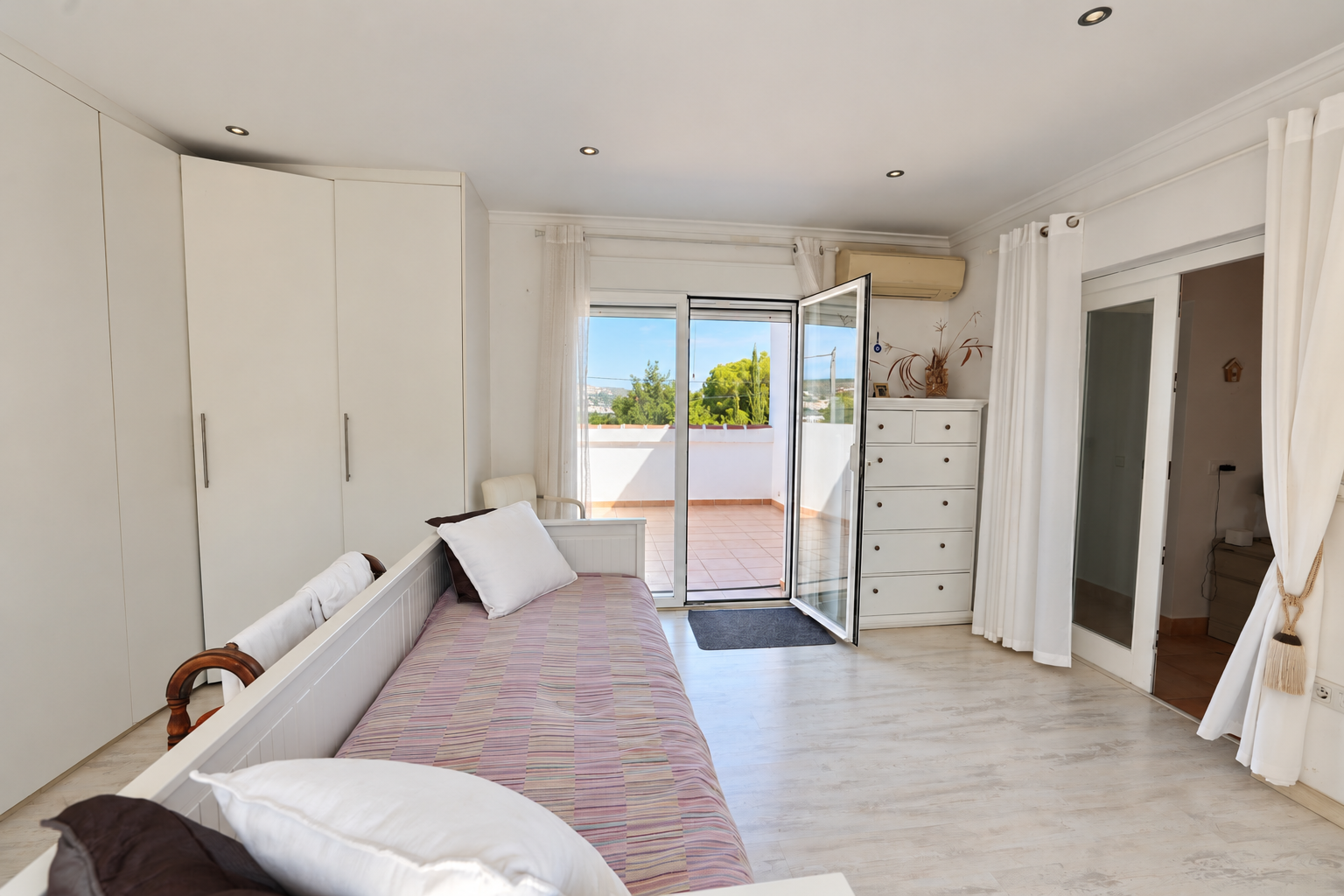 Slaapkamer met privéterras
