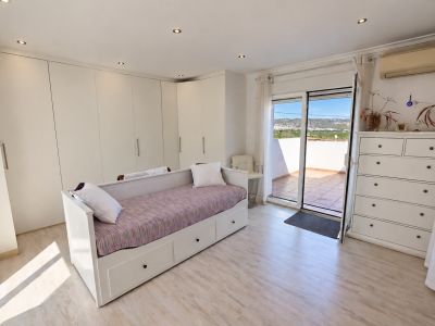 Slaapkamer met privéterras
