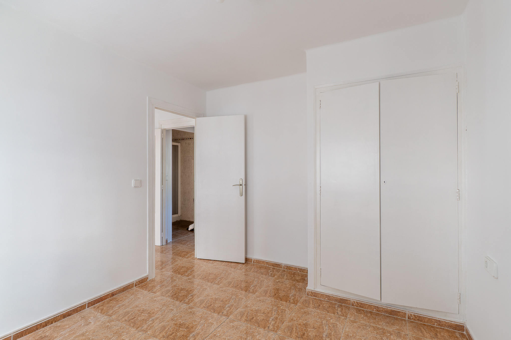 Slaapkamer met inbouwkast