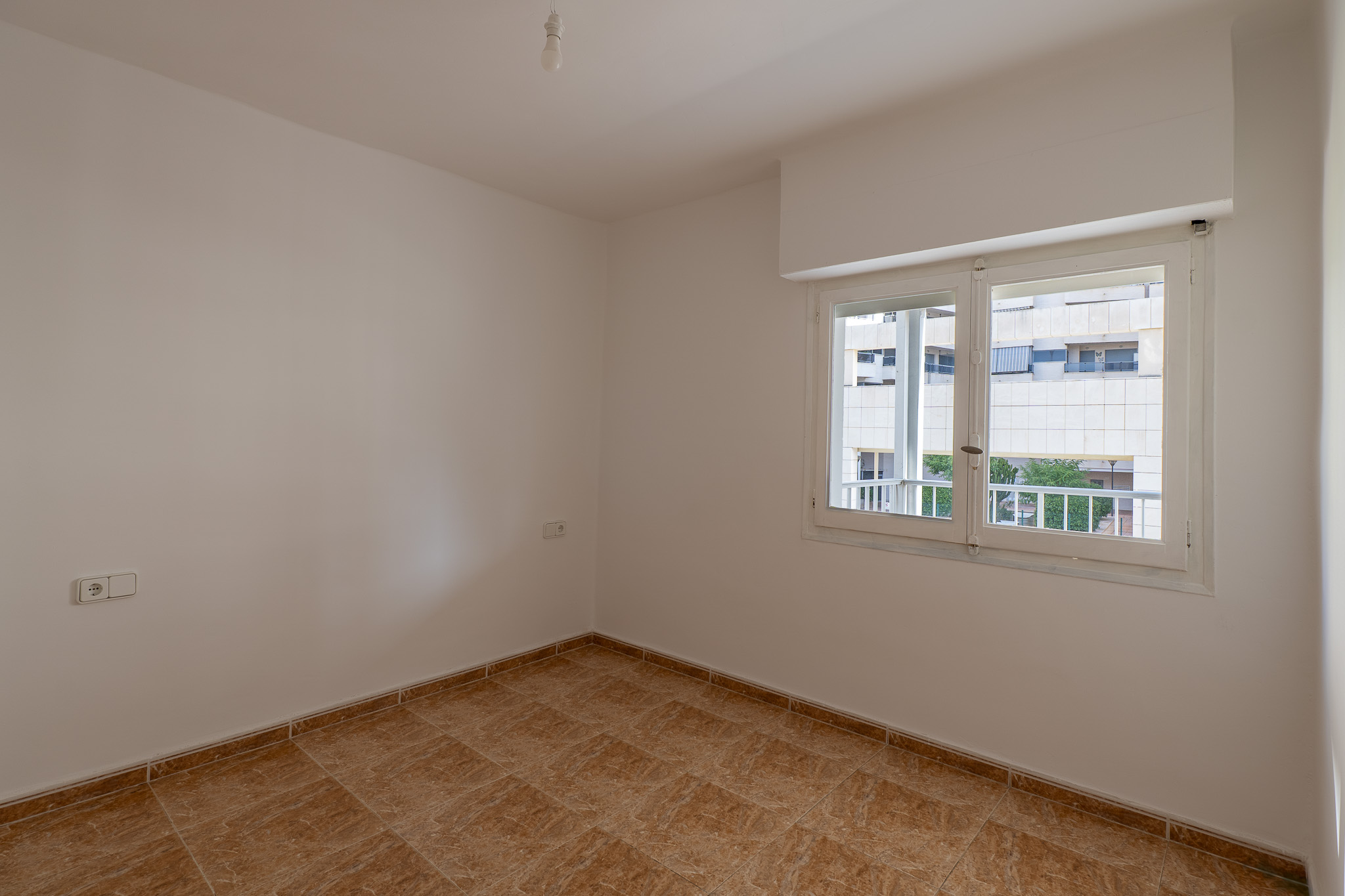Slaapkamer met raam