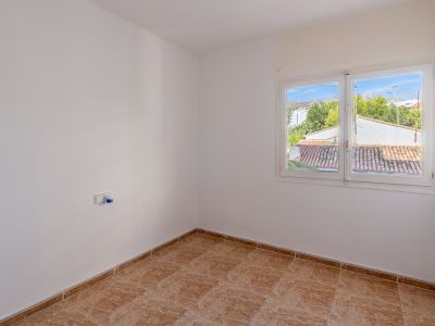 Slaapkamer met raam