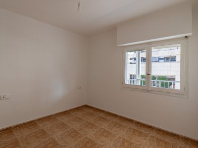 Slaapkamer met raam