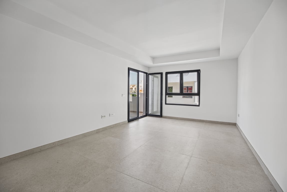 Woonkamer met toegang tot terras