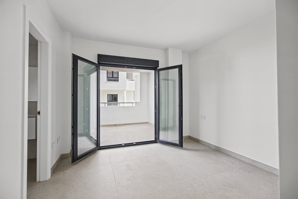 Slaapkamer met toegang tot het terras