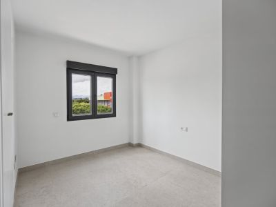 Slaapkamer met raam