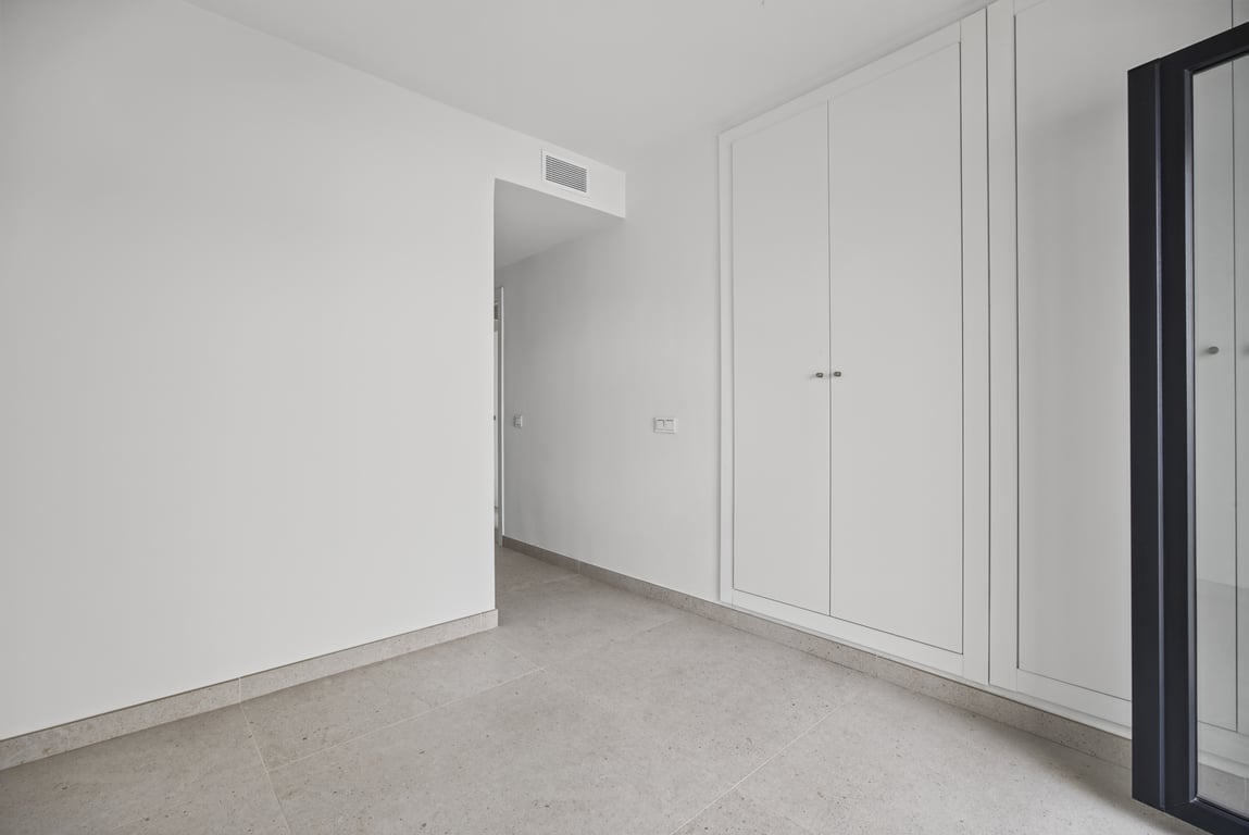 Slaapkamer met inbouwkasten