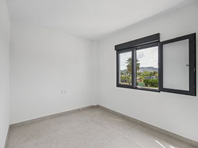 Slaapkamer met raam