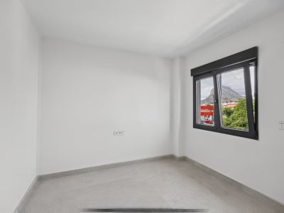Slaapkamer met bergzicht