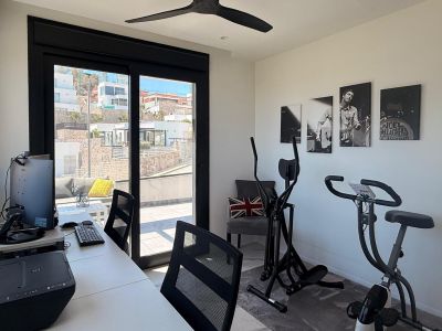 Werkkamer en fitnessruimte