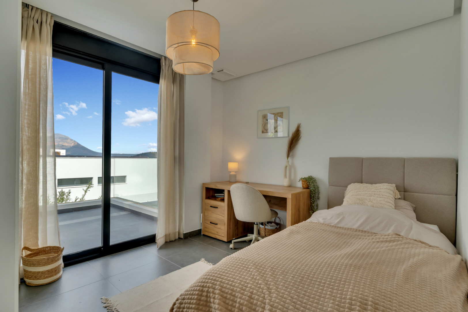 Slaapkamer met balkon