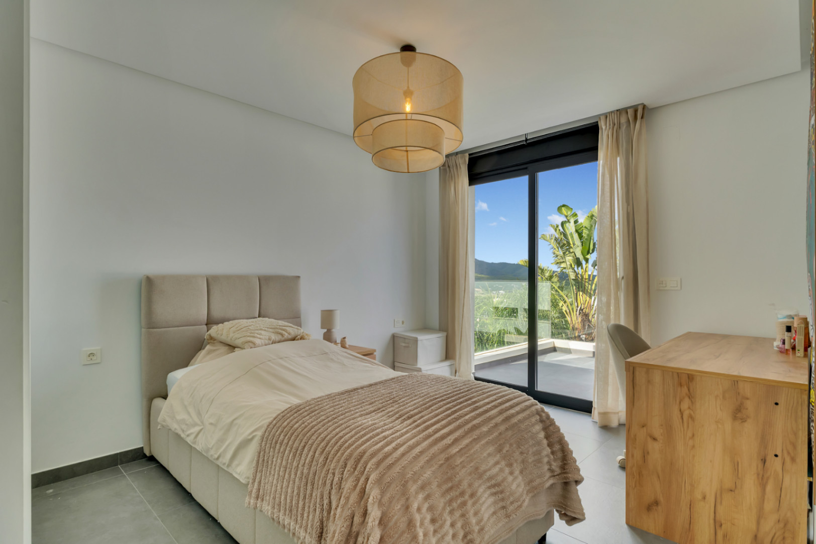 Slaapkamer met balkon