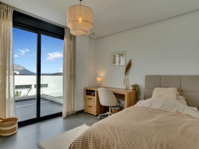 Slaapkamer met balkon