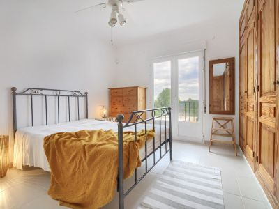 Slaapkamer met balkon