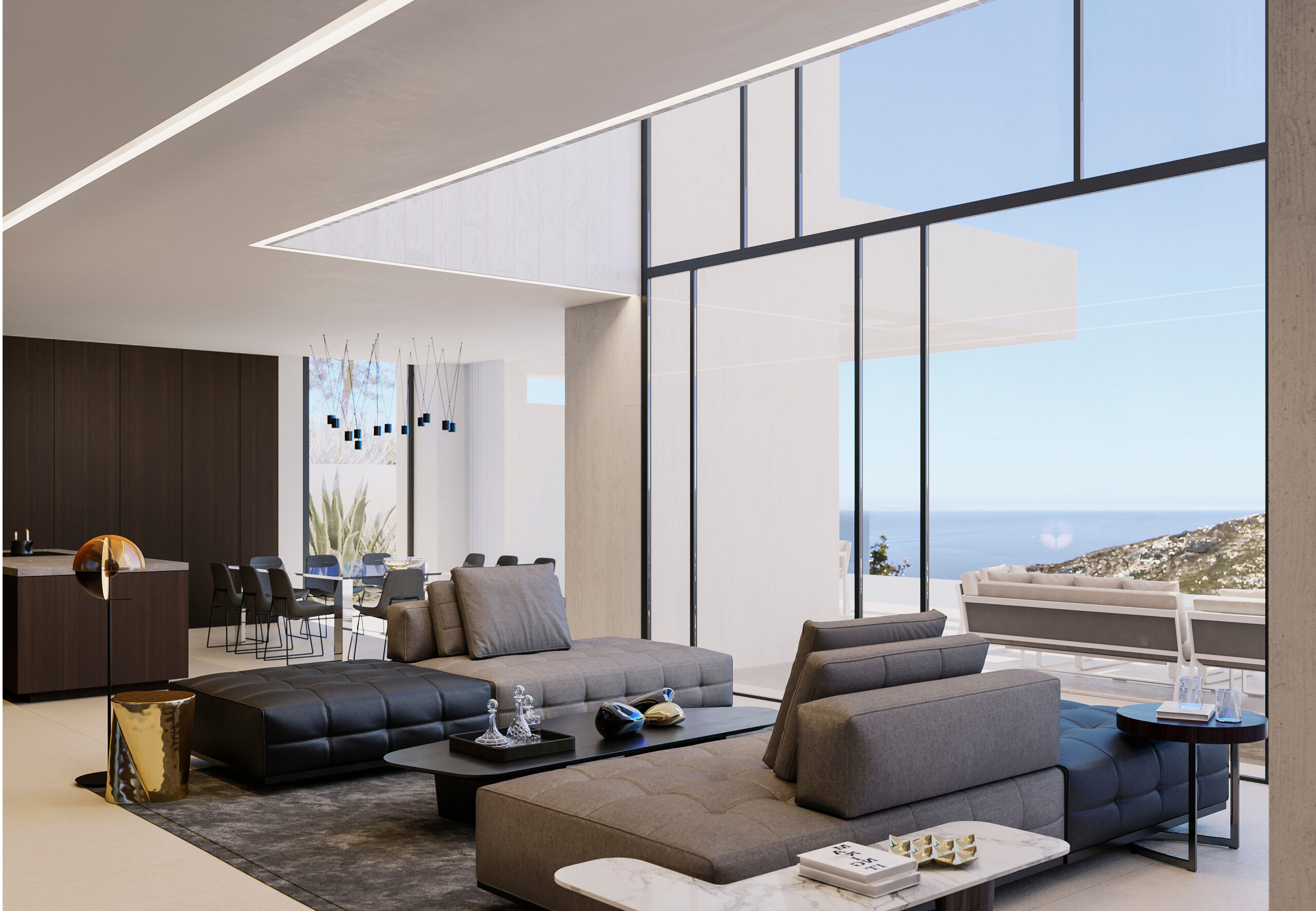 Open woonkamer met modulaire banken, kamerhoge glazen puien met uitzicht op zee en een dubbelhoog plafond met geïntegreerde LED-verlichting.