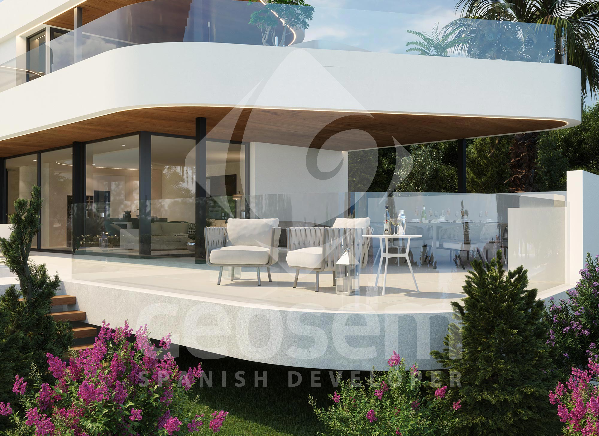 Buitenterras met organische lijnen, glazen balustrades en een houten plafond met LED-verlichting. Voorzien van loungezetels en omringd door een verzorgde mediterrane tuin.