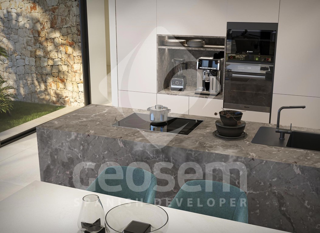 Designkeuken met een grijs geaderd stenen eiland, geïntegreerde inductiekookplaat en hoogwaardige inbouwapparatuur in minimalistische witte kasten.