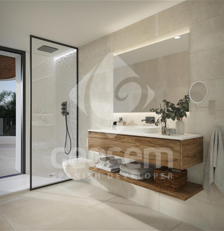 Eigentijdse badkamer met zwevend houten meubel, verlichte spiegel en inloopdouche met zwart profiel en beige keramische wand- en vloertegels.