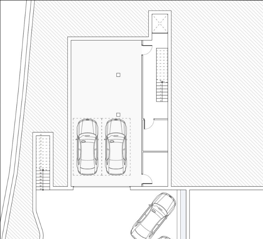Technische plattegrond van het garageniveau met parkeergelegenheid voor meerdere auto's, lifttoegang en een interne trap naar de bovenverdiepingen.