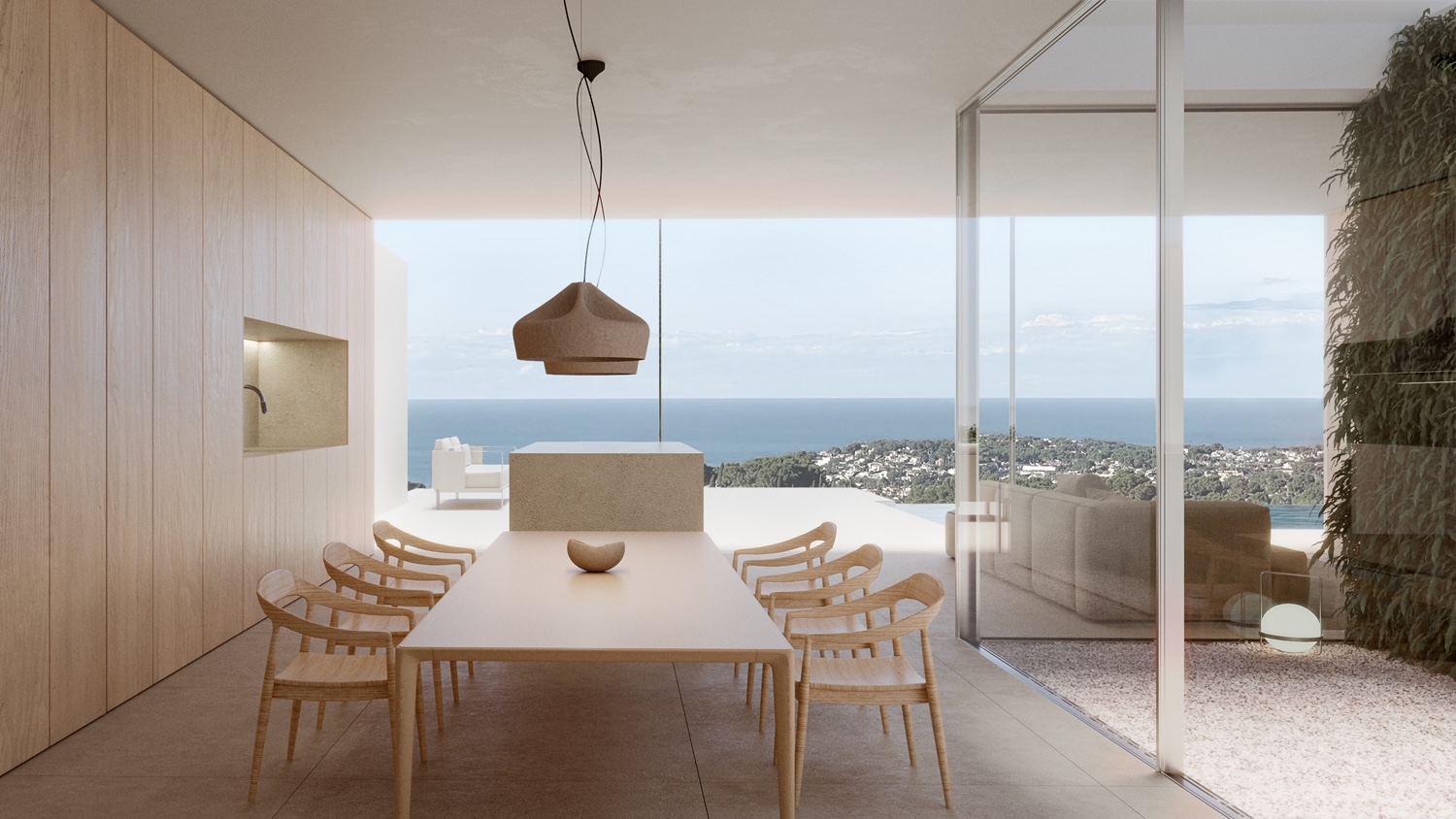 Minimalistische eethoek met houten tafel, design hanglamp en kamerhoge ramen met panoramisch uitzicht op zee en directe toegang tot het aangrenzende terras.
