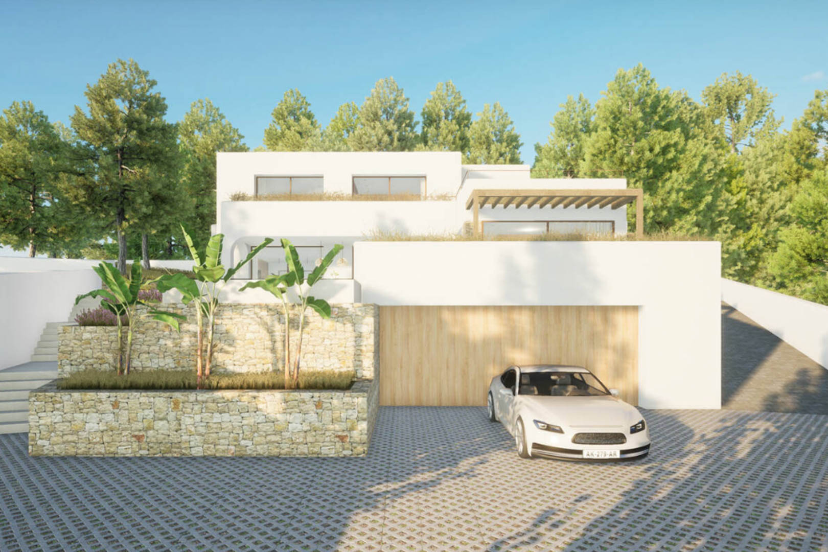 Exterieur van de villa met witte gevel, houten garage en stenen tuin met groen.