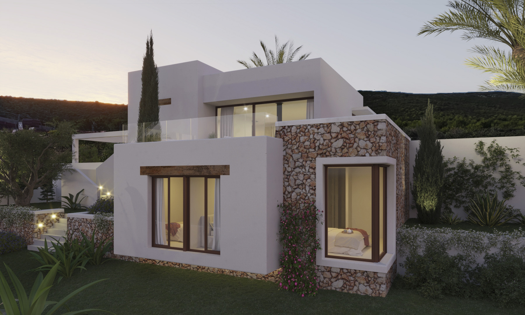 Exterieur in Ibiza-stijl met natuurstenen muren, witte volumes en grote raampartijen in een sfeervol verlichte mediterrane tuin tijdens de schemering.