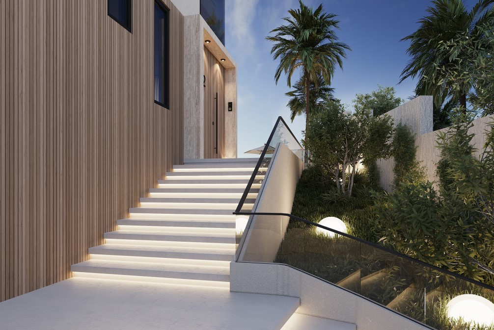 Moderne entree met verlichte trap en verticale houten gevelbekleding. Aangelegde zijtuin met bolvormige verlichting.