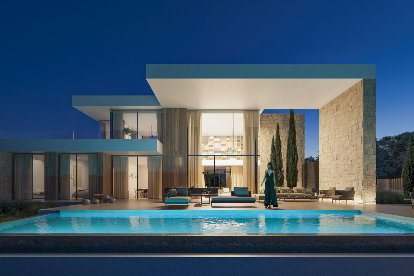 Externe nachtopname met verlicht overloopzwembad, kamerhoge glazen gevels en natuurstenen muren gecombineerd met een strak, modern architectonisch ontwerp.