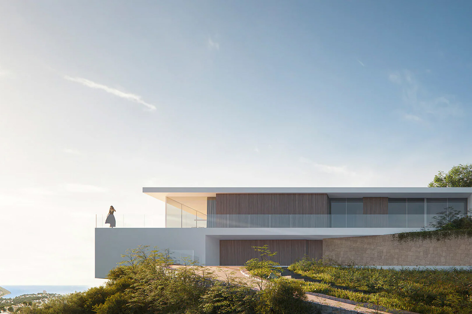 Moderne gevel met overstekende volumes, houten panelen en natuurstenen muren, voorzien van een glazen terras met panoramisch uitzicht op zee.
