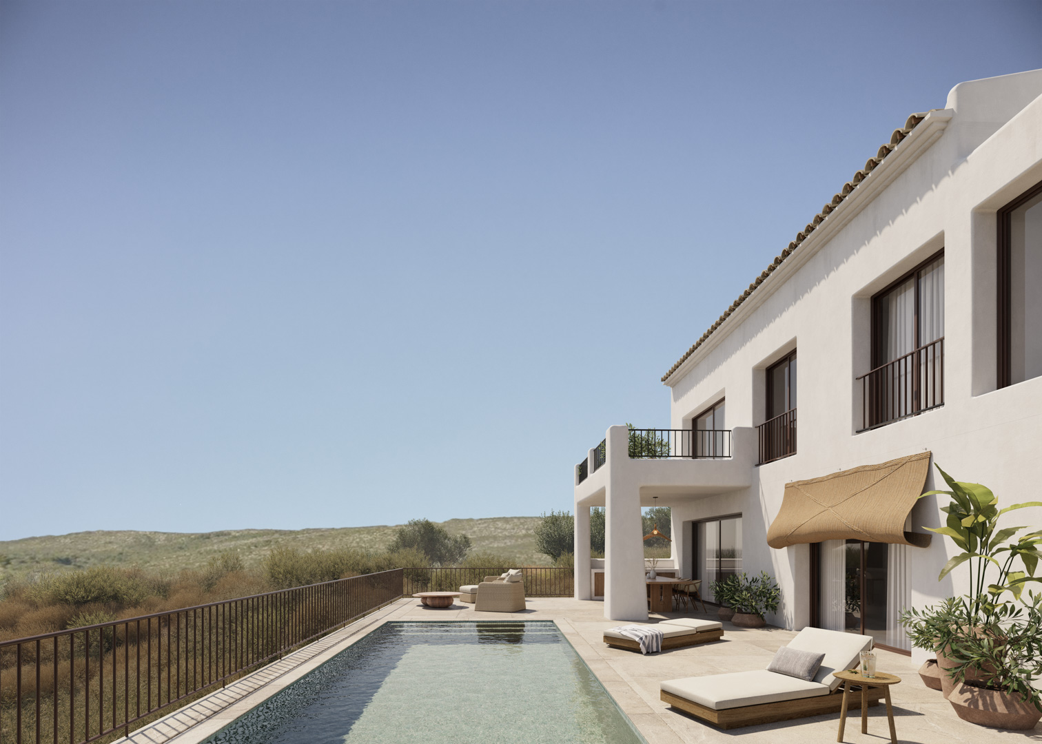 Witte gevel in Ibiza-stijl met rechthoekig zwembad, natuurstenen terras en buitenloungeruimtes met uitzicht op de schilderachtige Jalón-vallei.