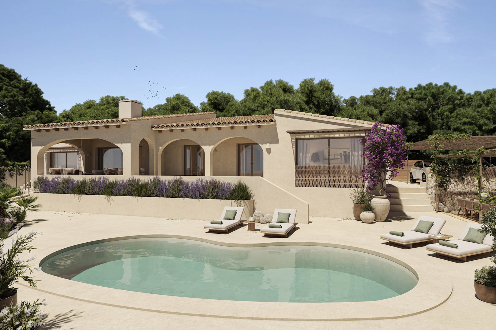 Mediterrane villa met boogvormige veranda's, een organisch gevormd zwembad en zonneterras omgeven door lavendel en bougainville.